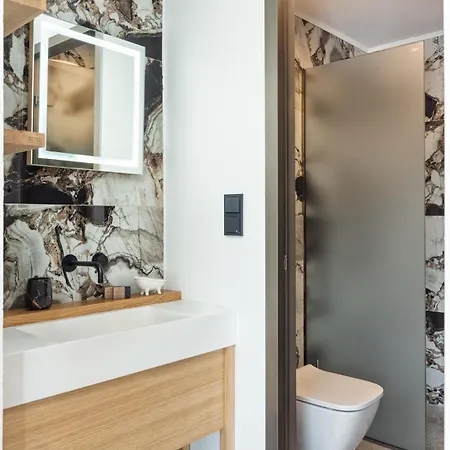 Lägenhetshotell Gonates 4*